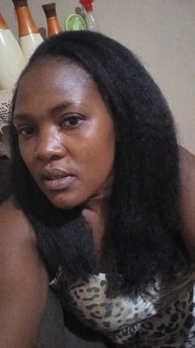 Customer photo review of Kinky Straight Seamless Tape In Extension 12A+Virgin Human Hair