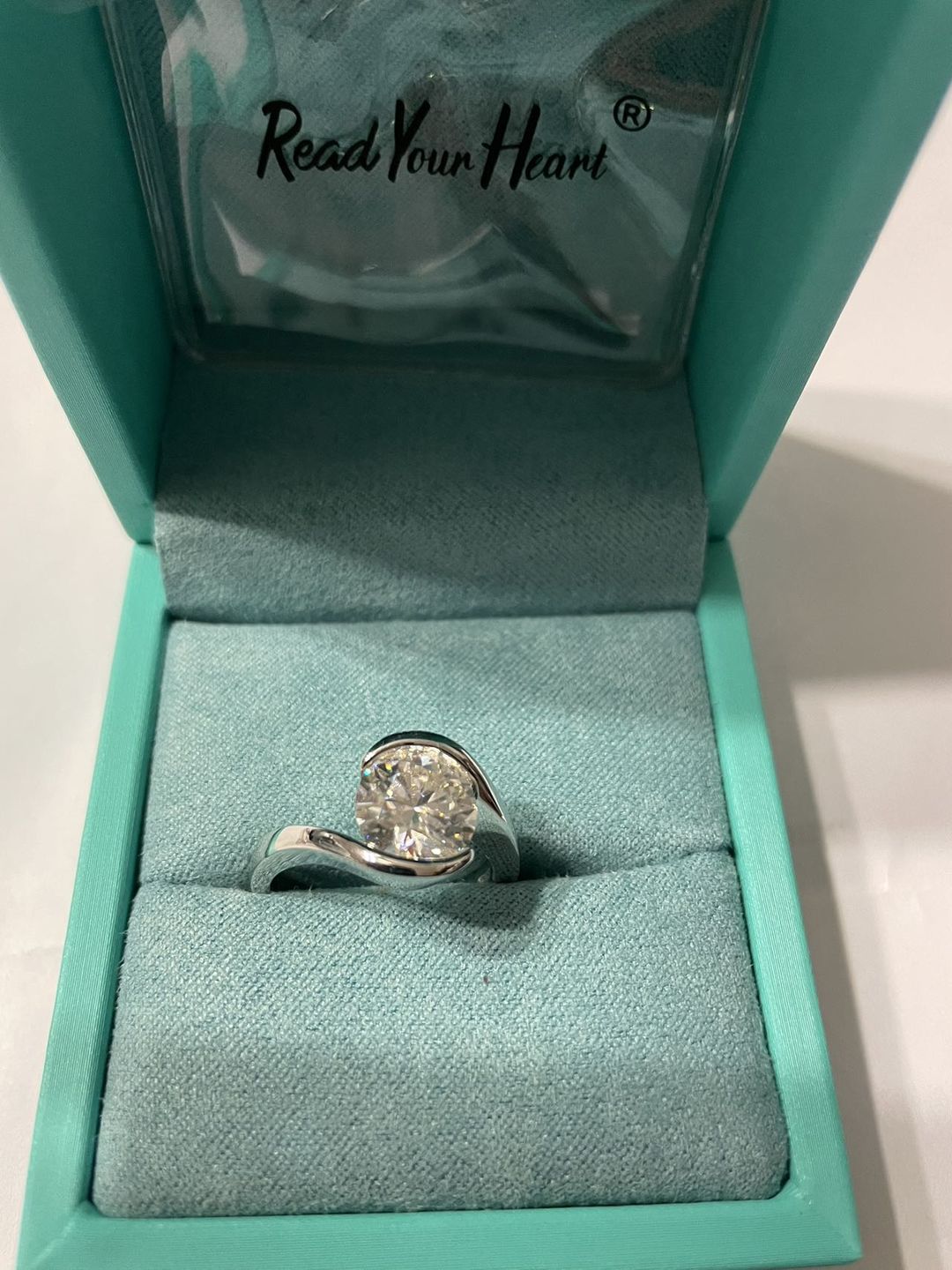 Customer photo review of Solitaire Tension Set Moissanite Bypass Engagement Ring