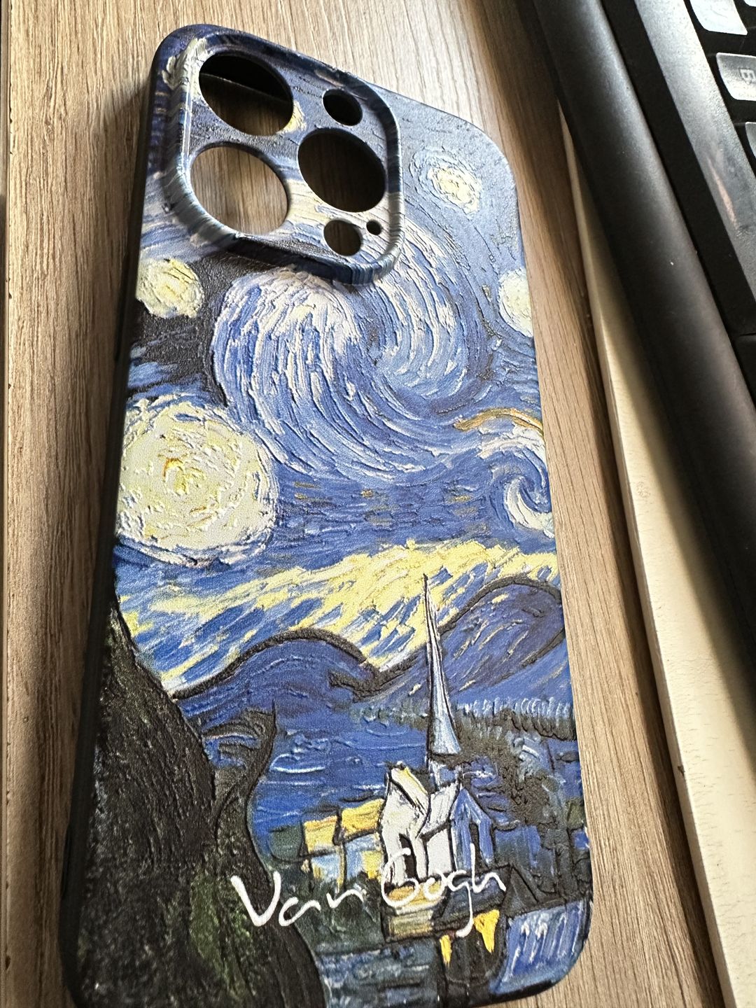 Customer photo review of Van gogh embossed iPhone cases