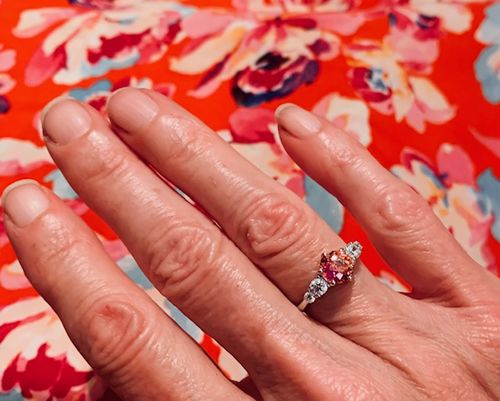 Customer photo review of Solitaire Kaleidoscope Red Orange CZ Ring in Sterling Silver