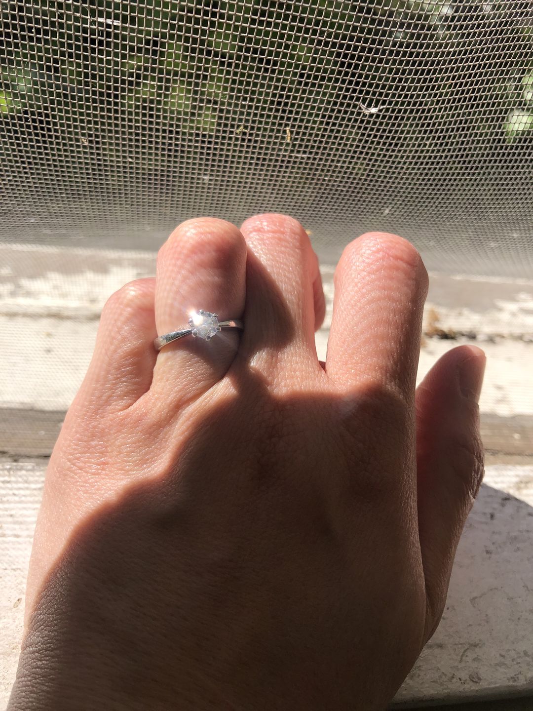 Customer photo review of Classic Solitaire Moissanite Six-Prong Sterling Silver Ring