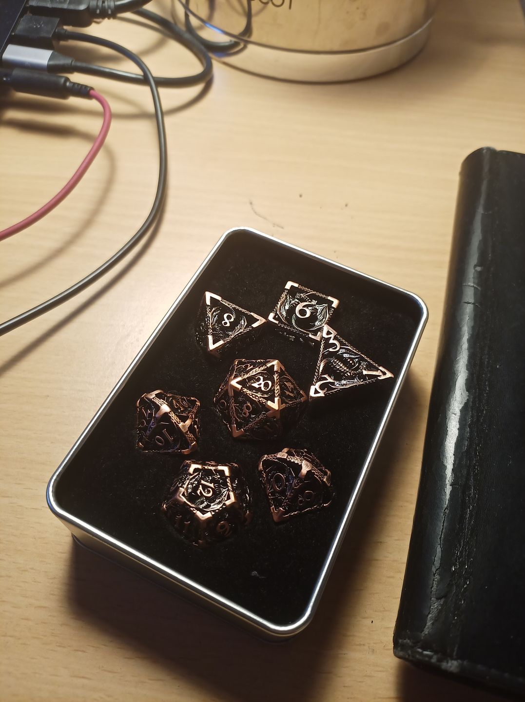 Customer photo review of Ancient Copper Dragon - Hollow Metal Dice Set