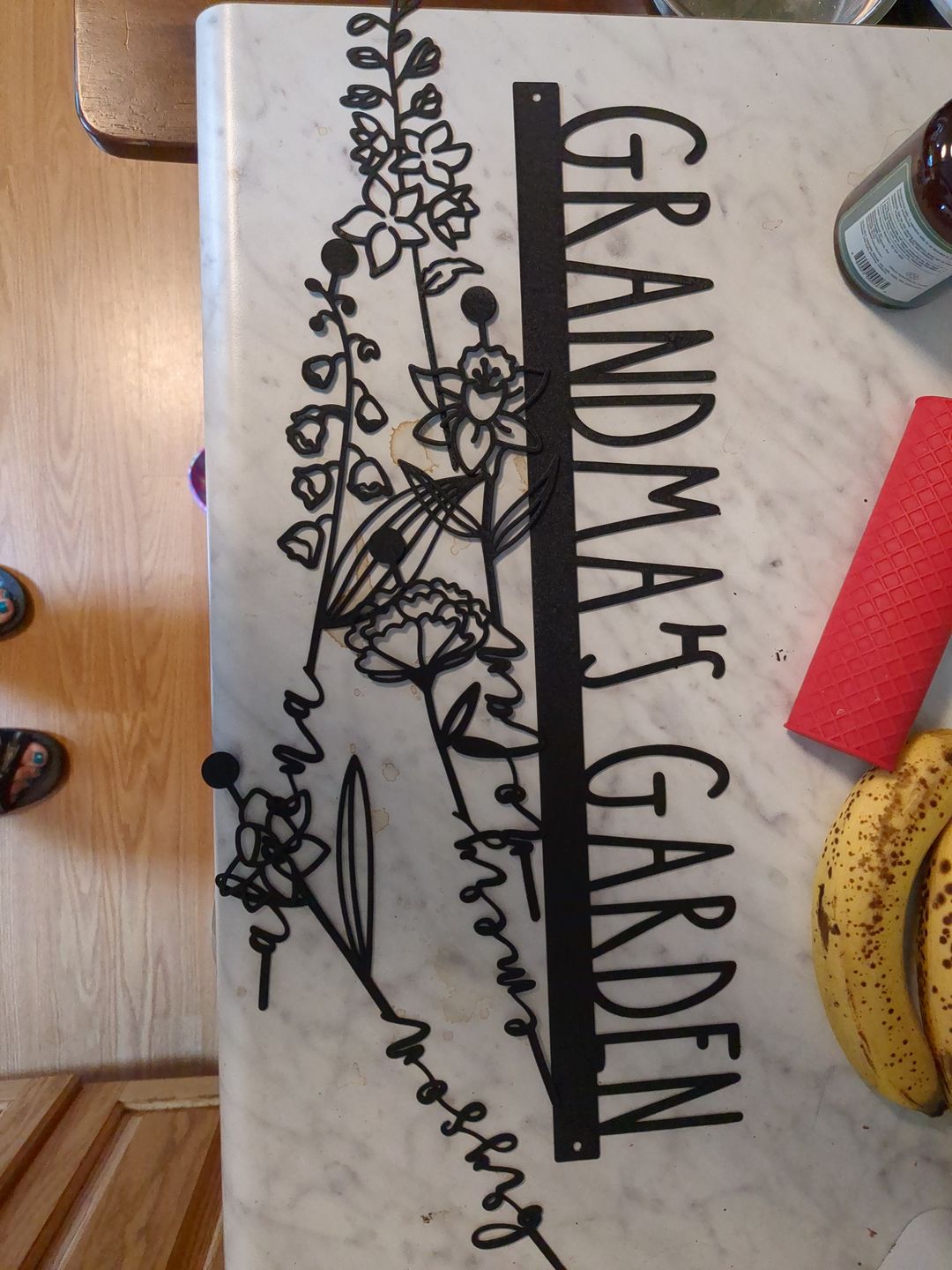 Customer photo review of Our Family Garden - Personalized Birth Month Flowers Family Name Sign Mother's Day Gift