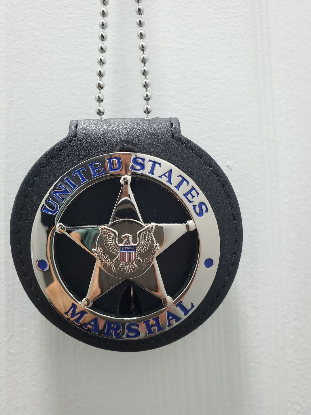 Customer photo review of US Federal Court Law Enforcement MARSHAL Badge Solid Copper Replica Movie Props