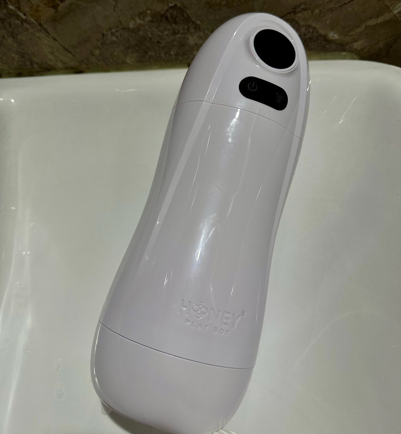 Customer photo review of KAI 2 Automatic Sucking Vibrating Male Masturbator Blowjob Sex Toy