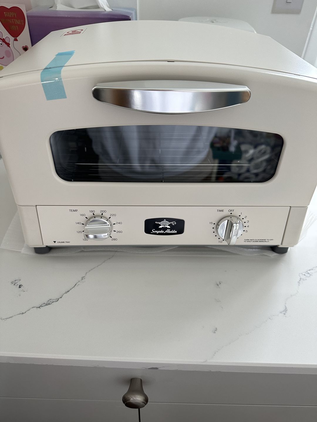 Customer photo review of 0.2s Heat Up! Aladdin Graphite Grill and Toaster - White