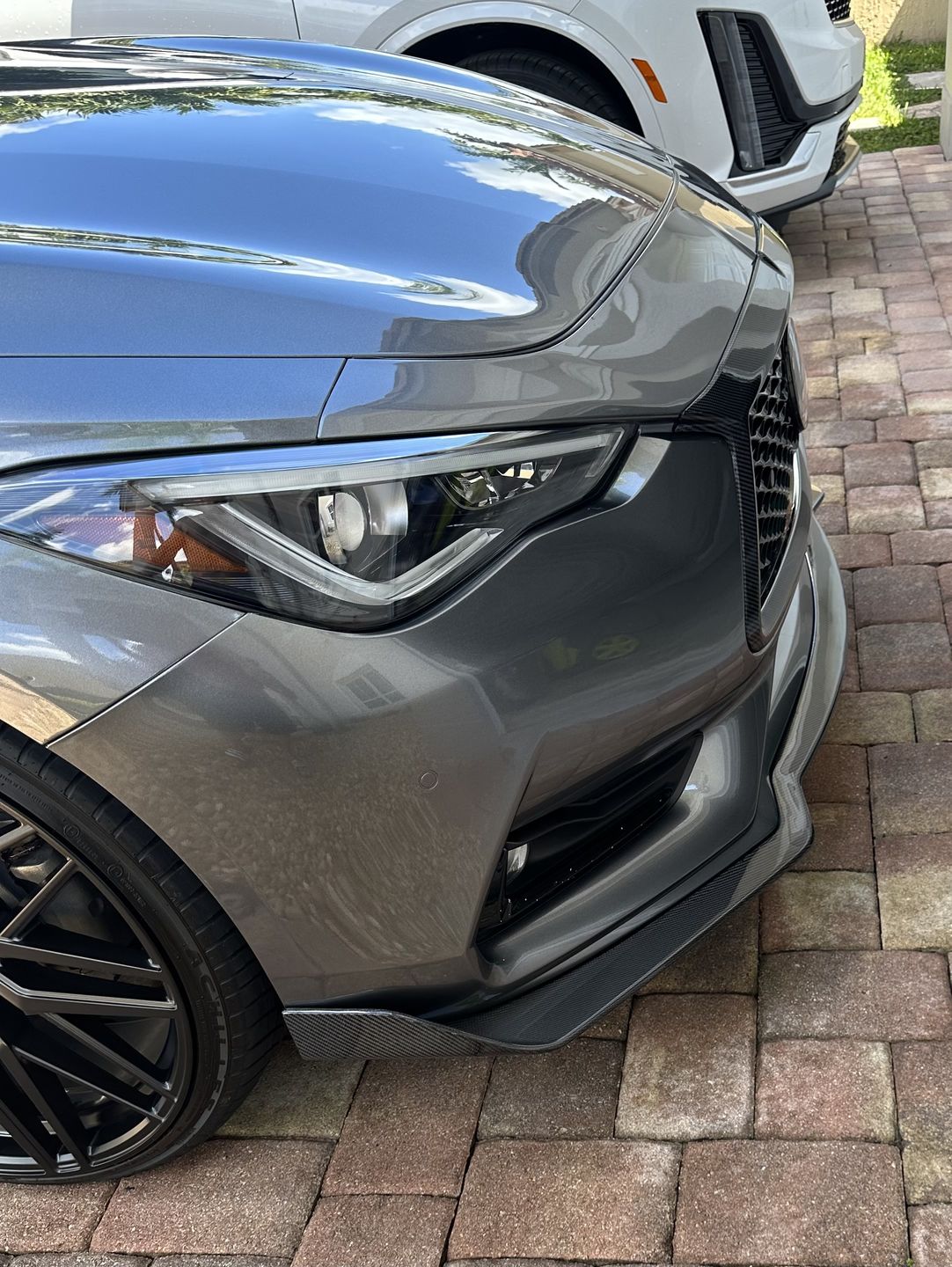 Customer photo review of 2017-Up Infiniti Q60 Carbon Fiber Front Splitter Ground Effect