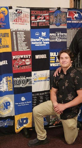 T-shirt quilt featuring huskers wrestling team by Kodi from NE