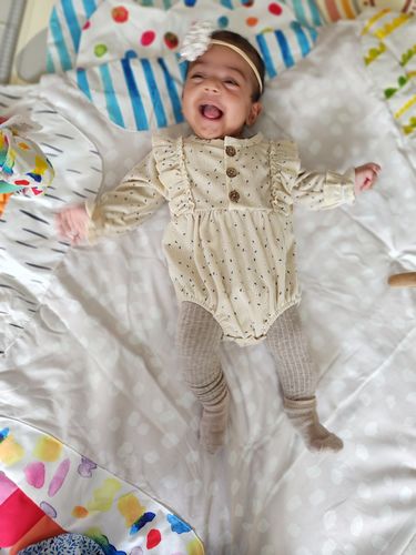 Customer photo review of Ruby floral jumpsuit in tan