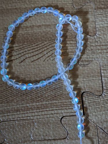 Customer photo review of 15.5" 6mm/8mm/10mm Rainbow Synthetic Moonstone round beads, matte finish mermaid glass