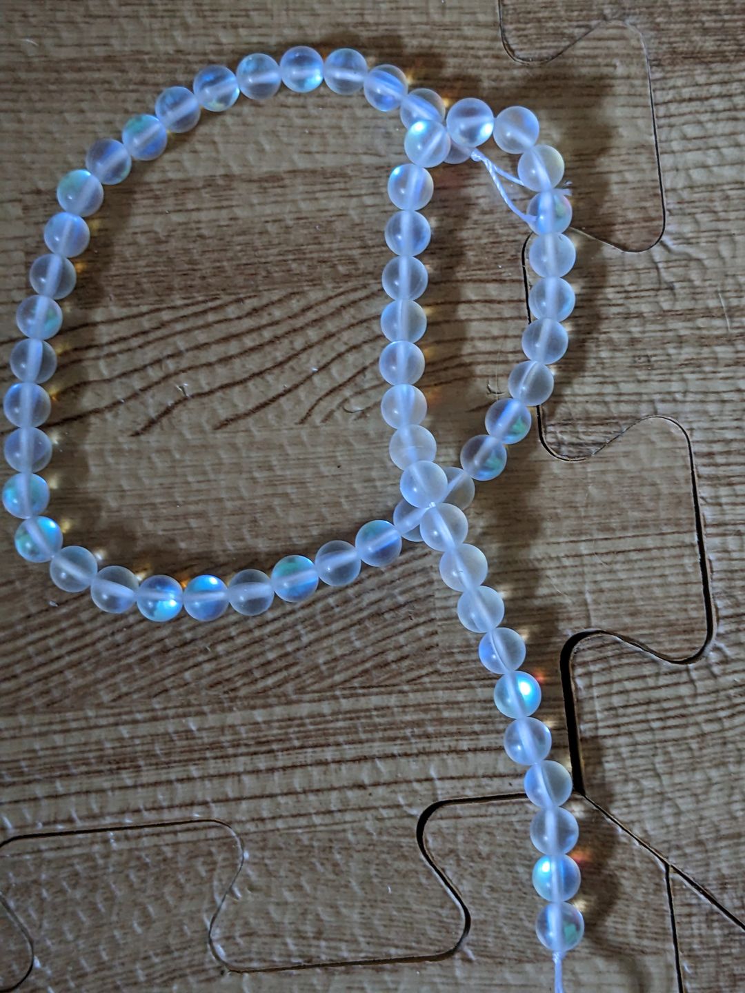 Customer photo review of 15.5" 6mm/8mm/10mm Rainbow Synthetic Moonstone round beads, matte finish mermaid glass