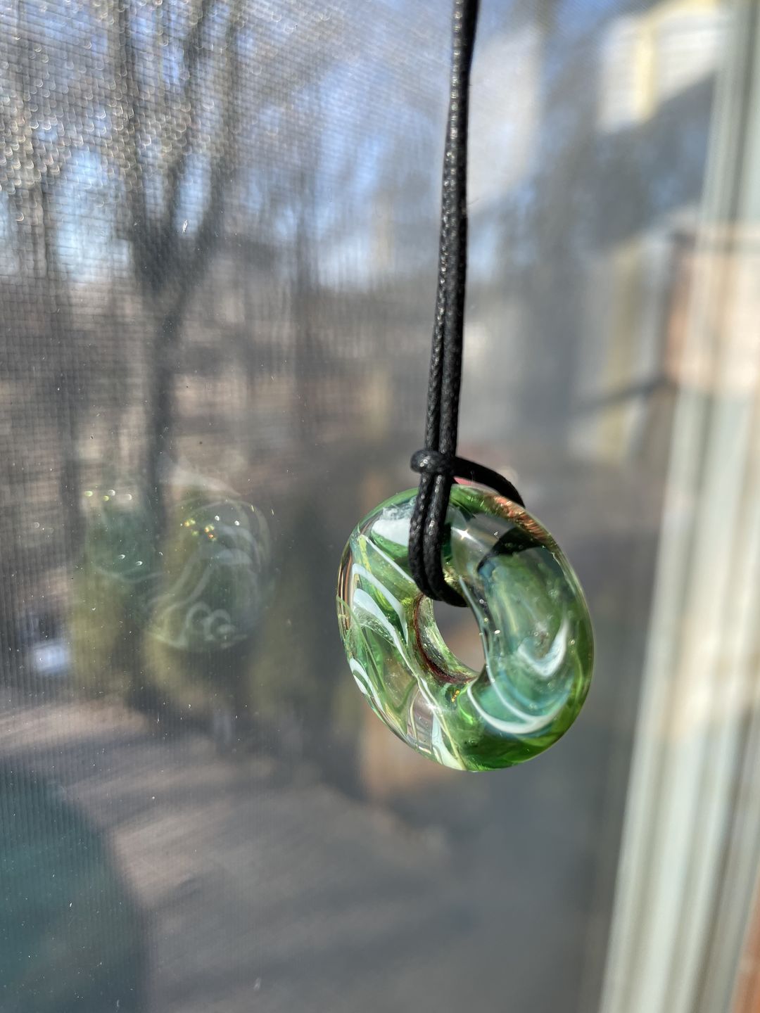 Customer photo review of Taffy Confetti Halo Pendant with Infused Cremation Ashes