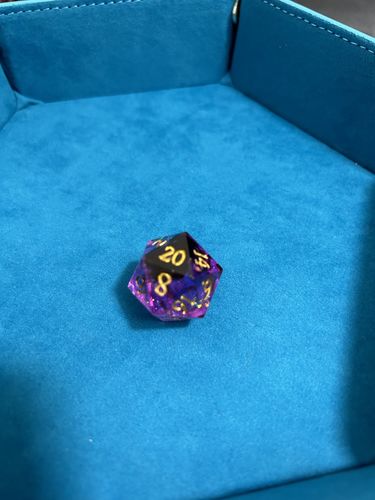 Customer photo review of Purple Glitter Resin DnD D&D Dice Set