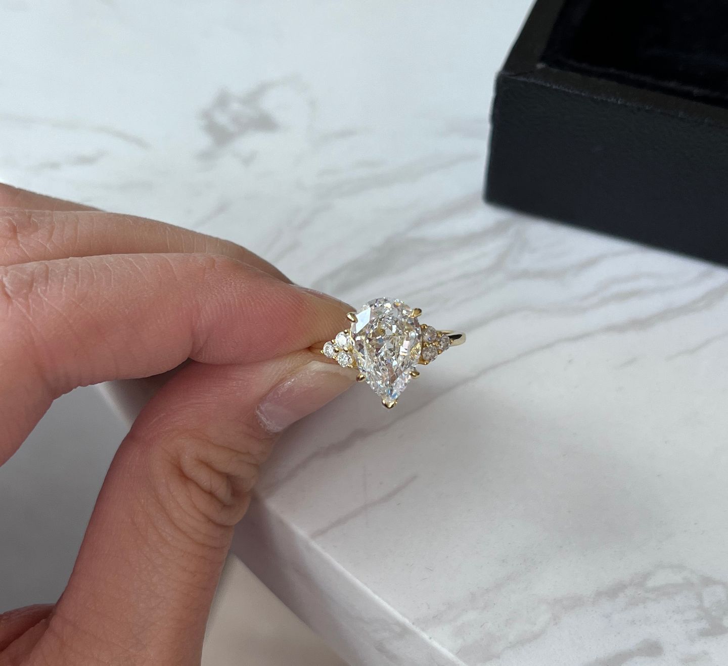 Customer photo review of Louily Pear Cut Simulated Diamond Engagement Ring In Sterling Silver