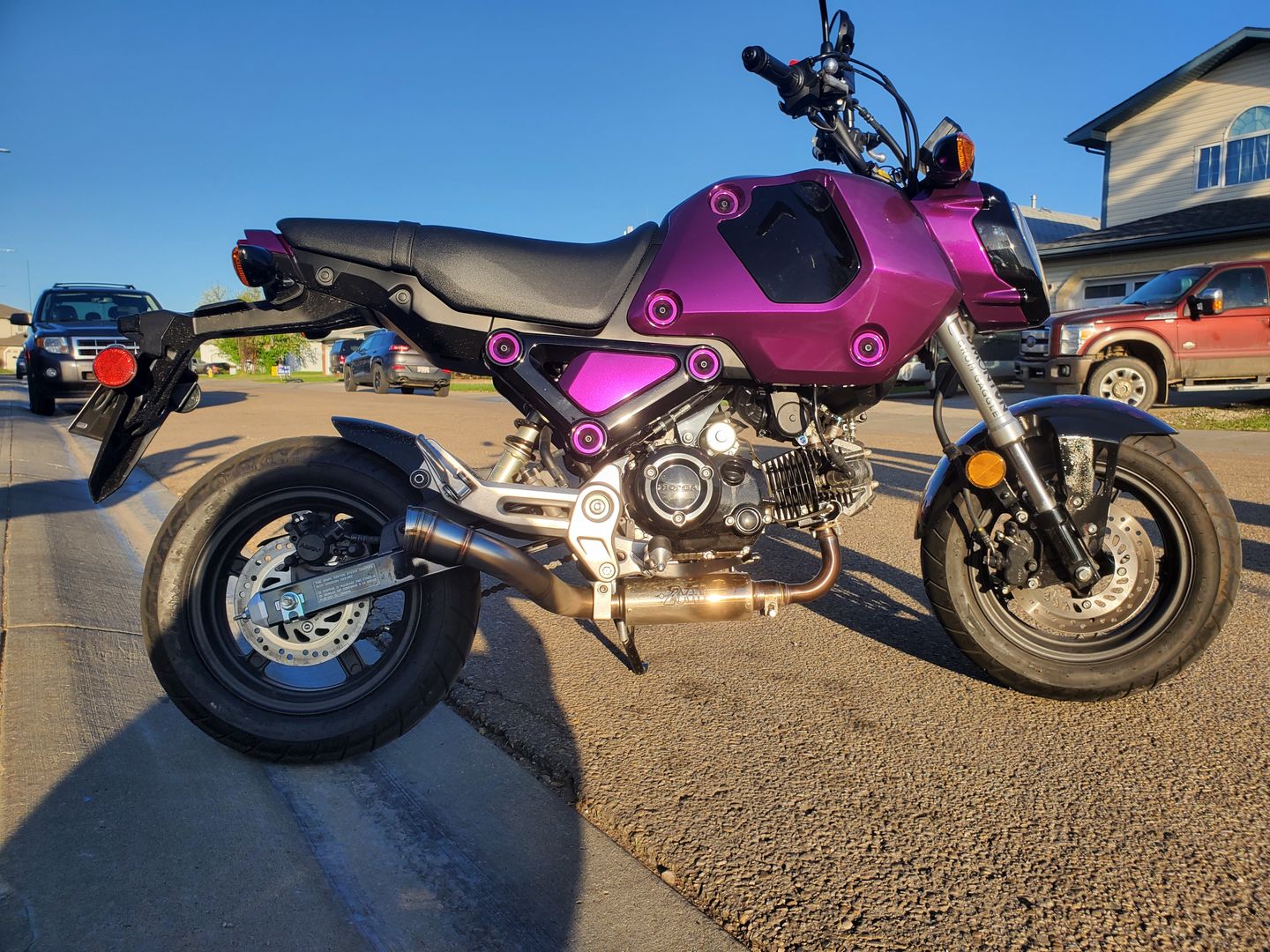 Customer photo review of Glossy Metallic Grape Purple Vinyl Wrap