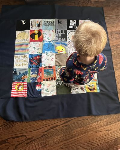 T-shirt quilt with family, community themes by Lisa from CO
