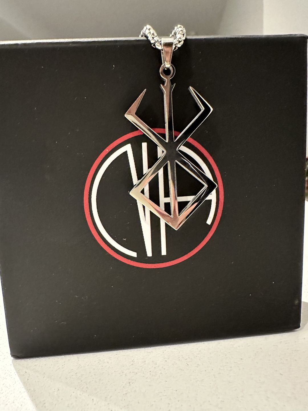 Customer photo review of Brand of Sacrifice Pendant