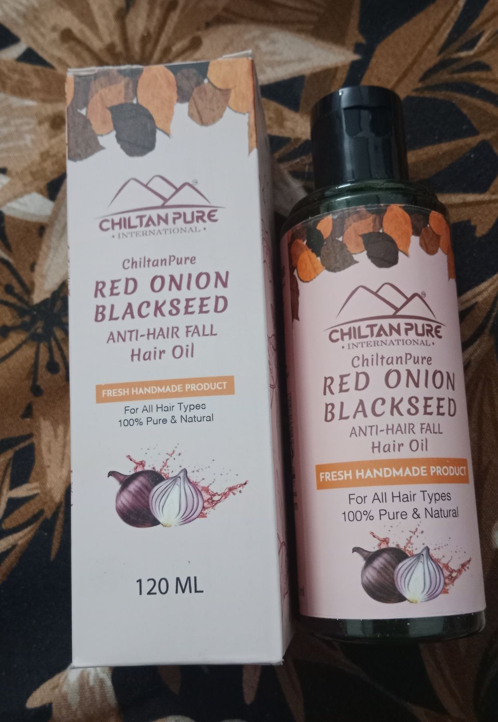 Customer photo review of Red Onion Blackseed Oil- Enhances Hair Growth, Anti-Hair fall, Prevents Premature Hair Growing, Makes Hair Strong & Glossy