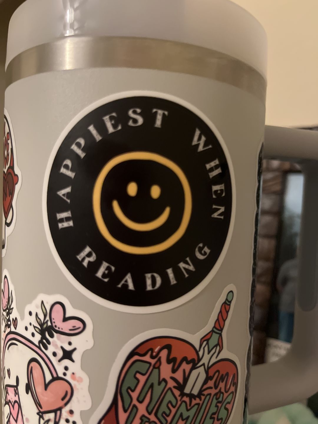 Customer photo review of happiest when reading sticker