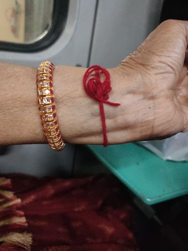 Customer photo review of Rubans 24K Gold Plated Handcrafted Ruby Stone & Kundan Set of 2 Bangles