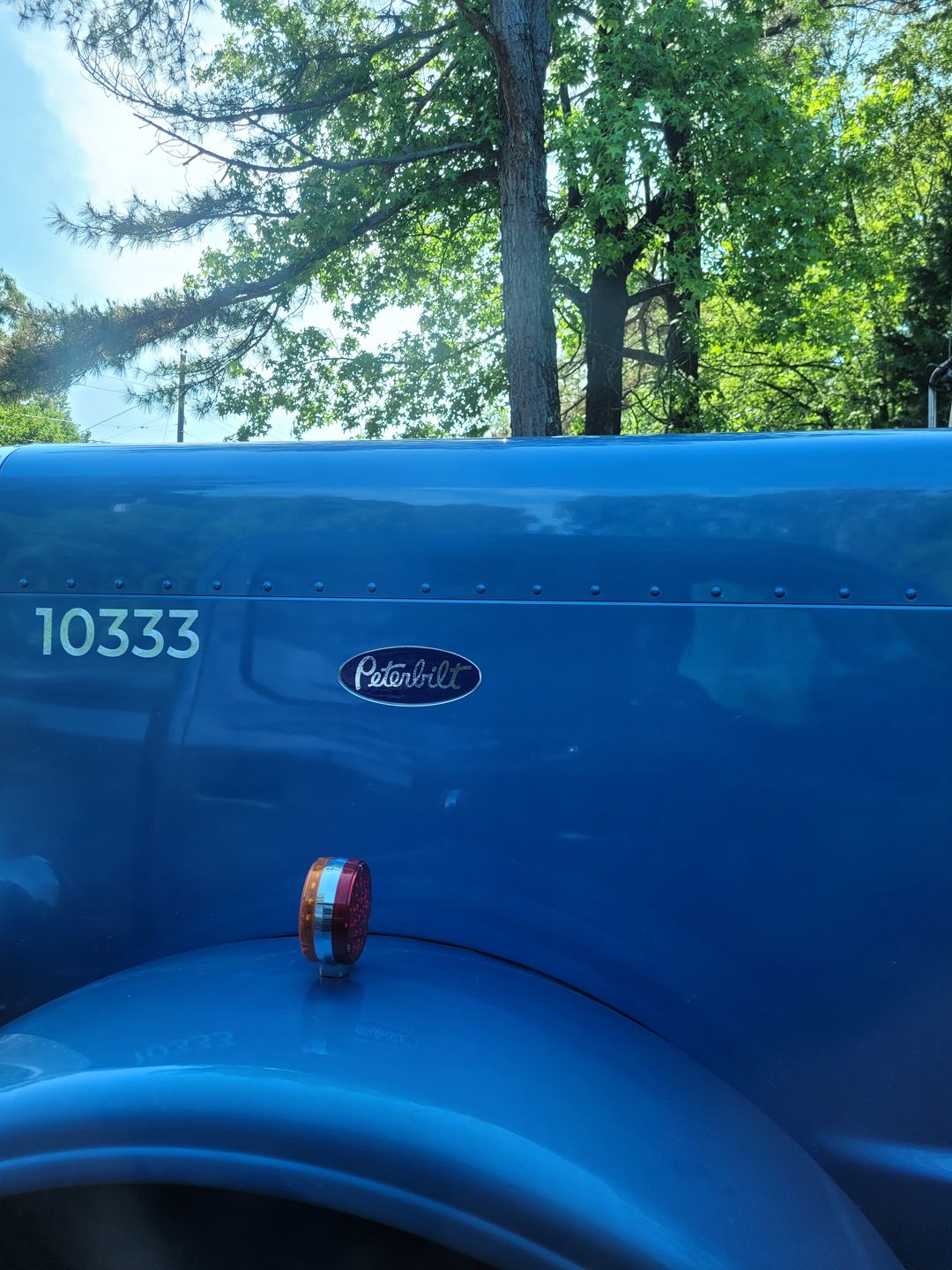 Customer photo review of replacement Peterbilt emblems genuine decals red ,green, white, black, blue