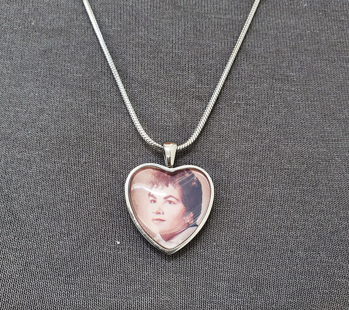Customer photo review of Photo Cremation Urn Necklace for Ashes Custom Engraving Pendant with Filling Tool