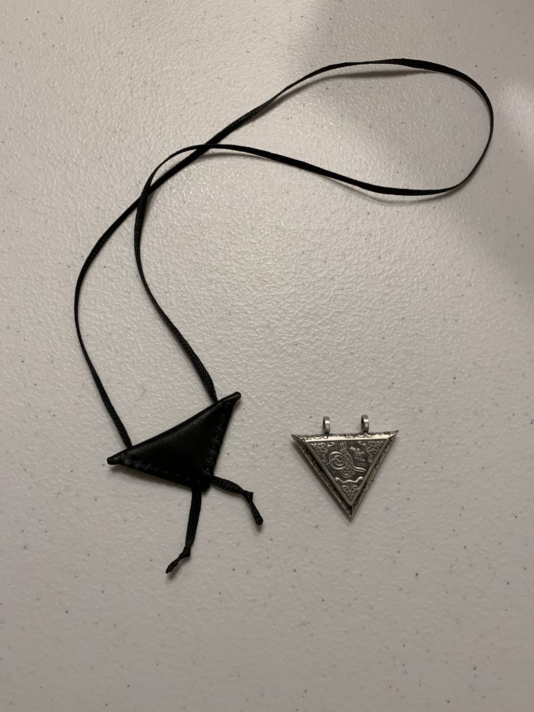 Customer photo review of Naqshbandi Taweez Necklace from Shaykh Nazim