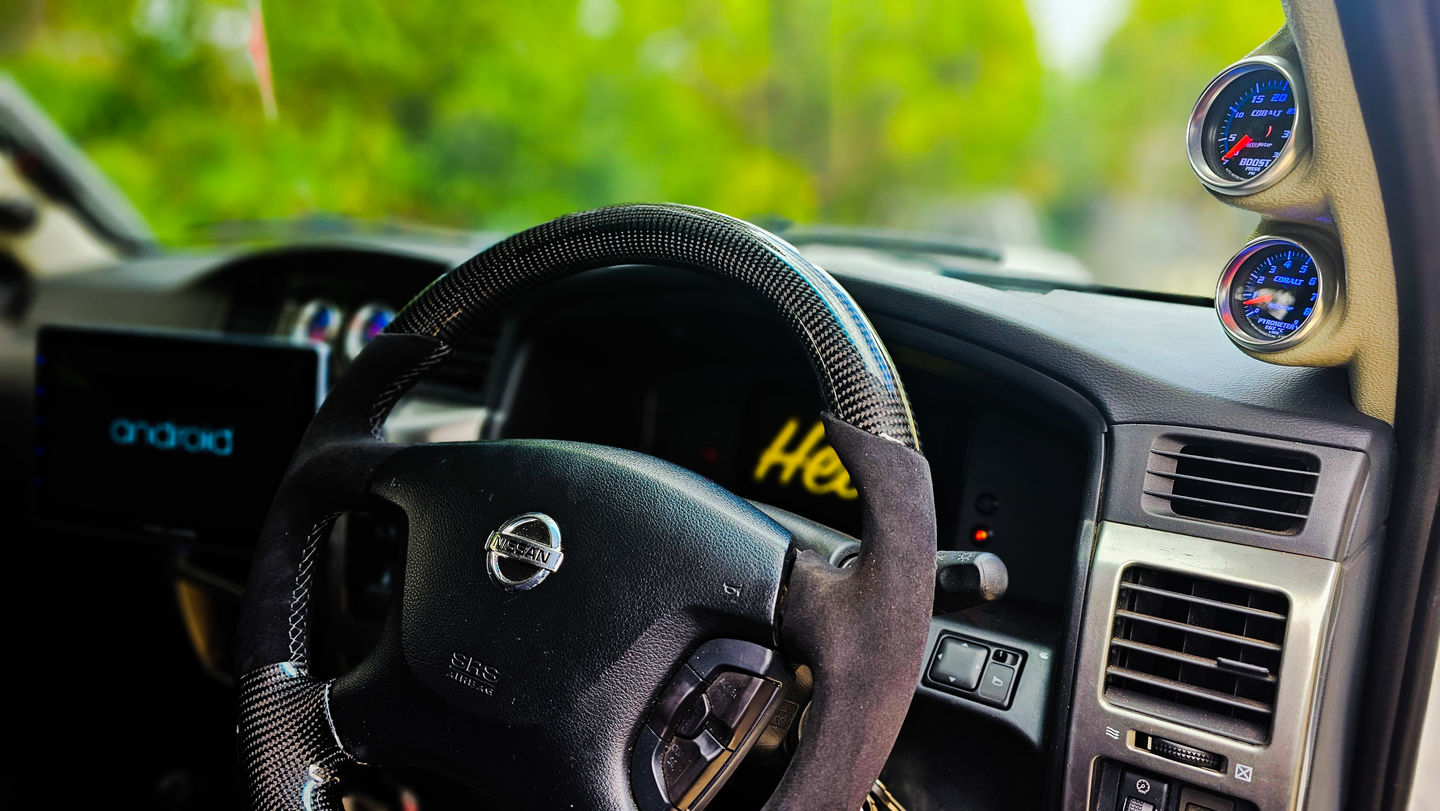 Customer photo review of Nissan Gu Patrol Y61 Premium Steering Wheel - 9040 Grade Alcantara