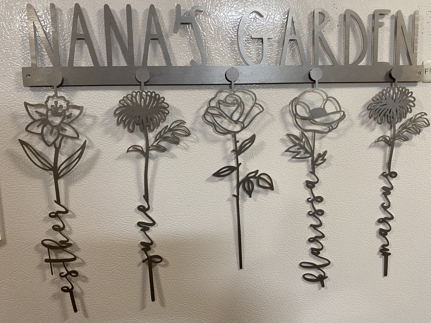 Customer photo review of Our Family Garden - Personalized Birth Month Flowers Family Name Sign Mother's Day Gift