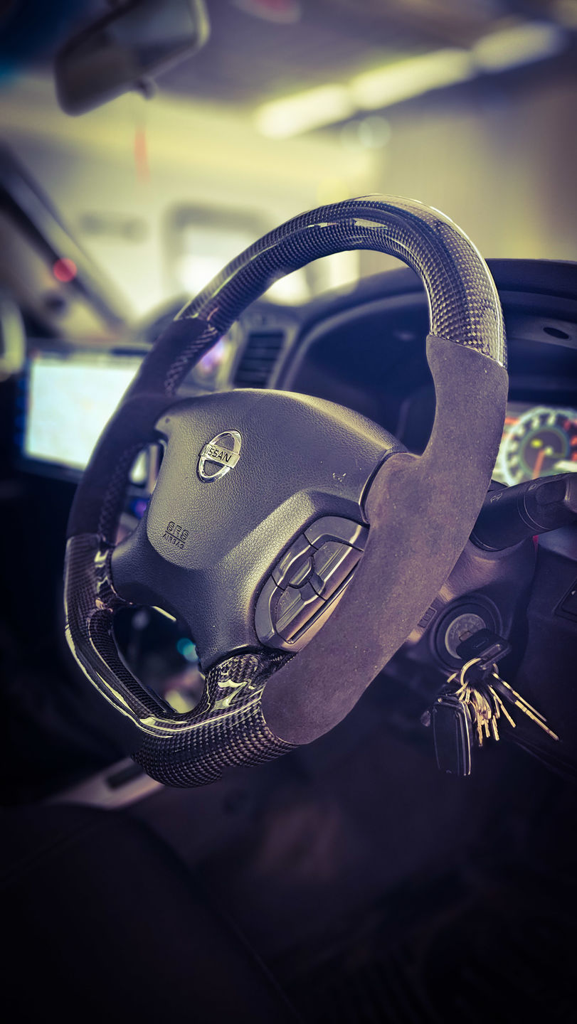 Customer photo review of Nissan Gu Patrol Y61 Premium Steering Wheel - 9040 Grade Alcantara