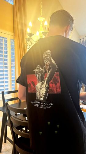 Customer photo review of Against All Odds : Statue - Black Tee