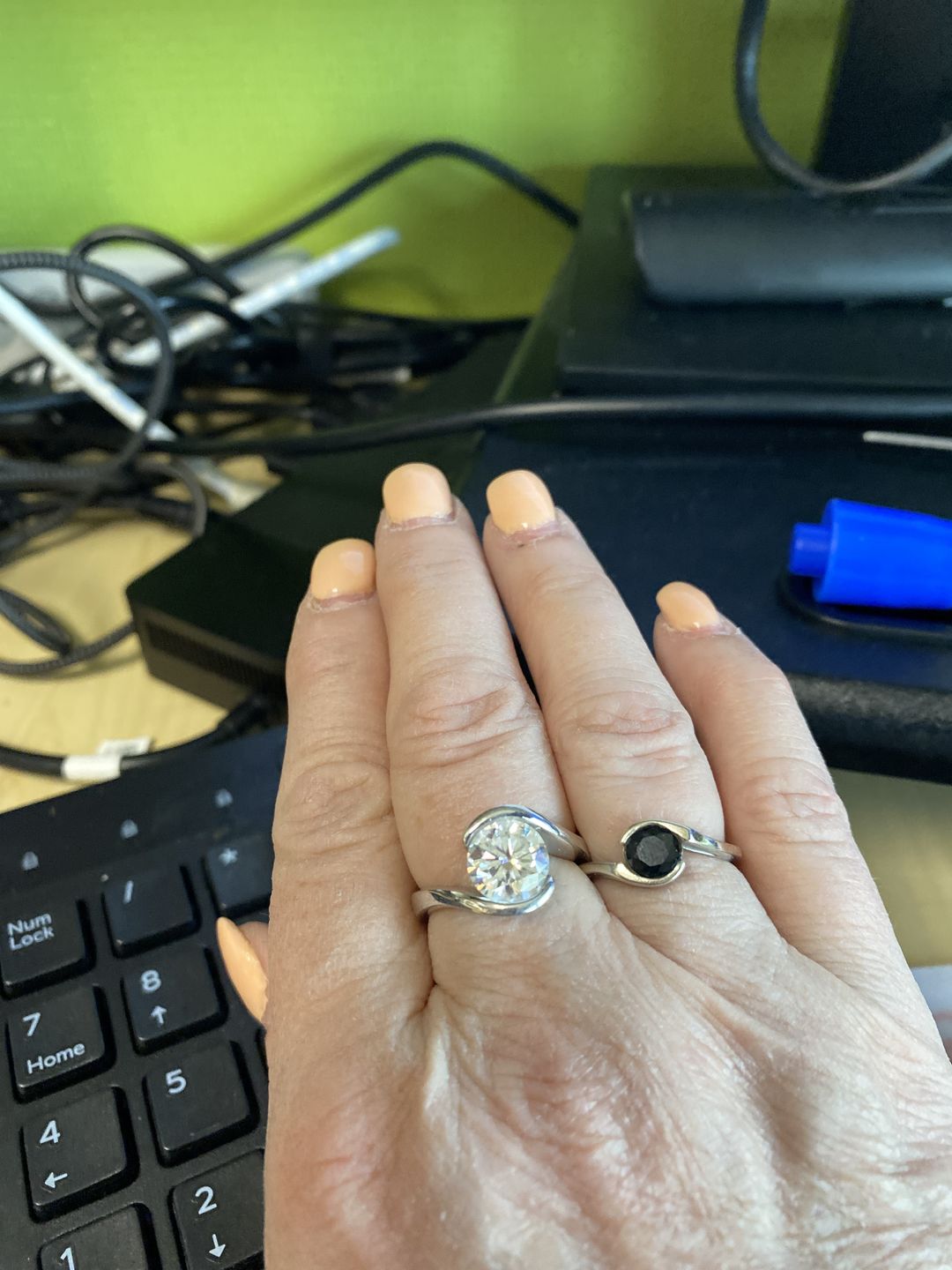 Customer photo review of Solitaire Tension Set Moissanite Bypass Engagement Ring