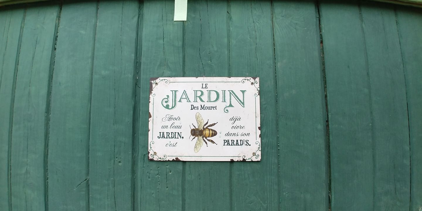 Customer photo review of Joie dans le jardin - Plaque de porte personnalisée