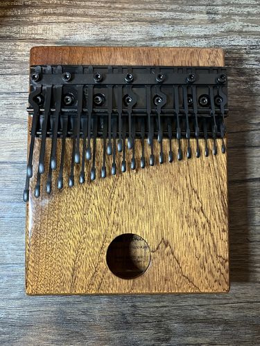 Customer photo review of 36 Keys Chromatic Kalimba Flat Board / Hollow Solid Wood Color Oxide Black Key Thumb Piano