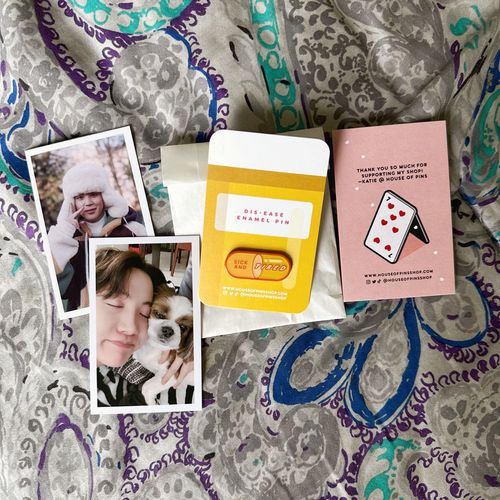 Customer photo review of Dis-ease Pin (Orange/Yellow)