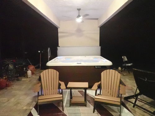 Customer photo review of QUICK SHIP - DuraWeather Poly® King Size Folding Adirondack Chair - Exclusive Wood Grain Poly-resin