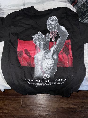 Customer photo review of Against All Odds : Statue - Black Tee