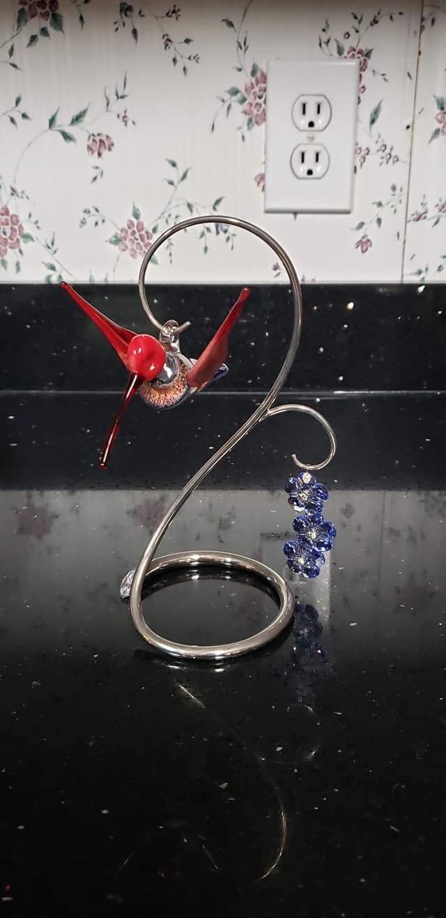 Customer photo review of Red Dichroic Twist Glass Hummingbird with Infused Ash
