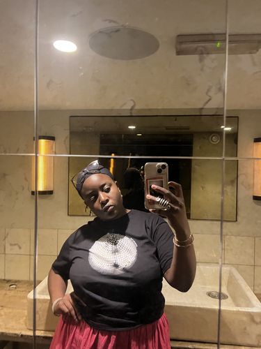 Customer photo review of 'Studio 54' baby tee