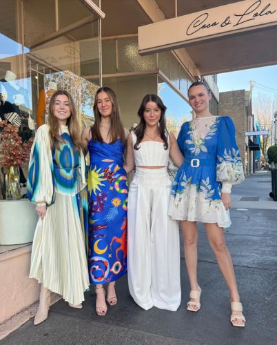 Customer photo review of Main Stage Unique Printed Ruched Cross Over Detail Strap Midi Dress