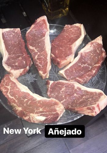 Reseña con foto de un cliente sobre New York Dry Aged