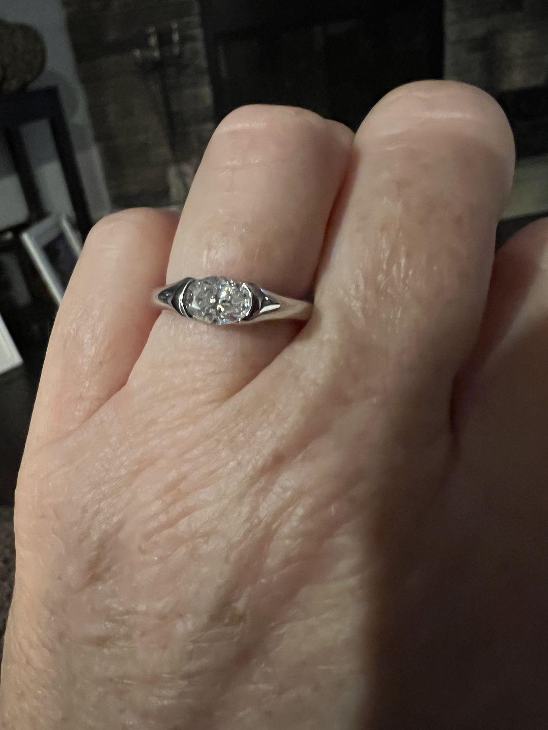 Customer photo review of Solitaire Oval Moissanite Half Bezel Set Engagement Ring