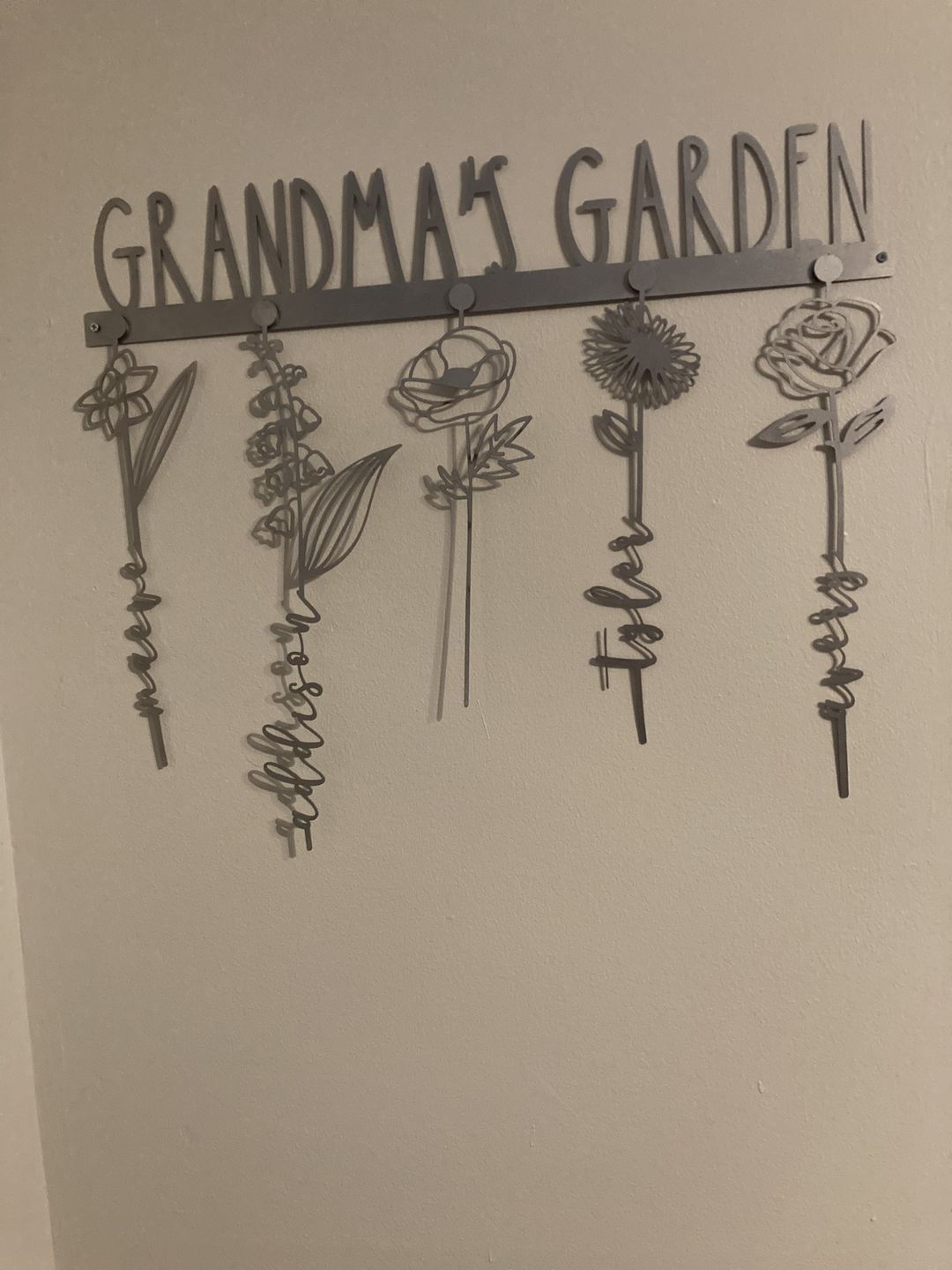 Customer photo review of Our Family Garden - Personalized Birth Month Flowers Family Name Sign Mother's Day Gift