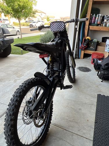 Customer photo review of Sur-Ron Foot Pegs