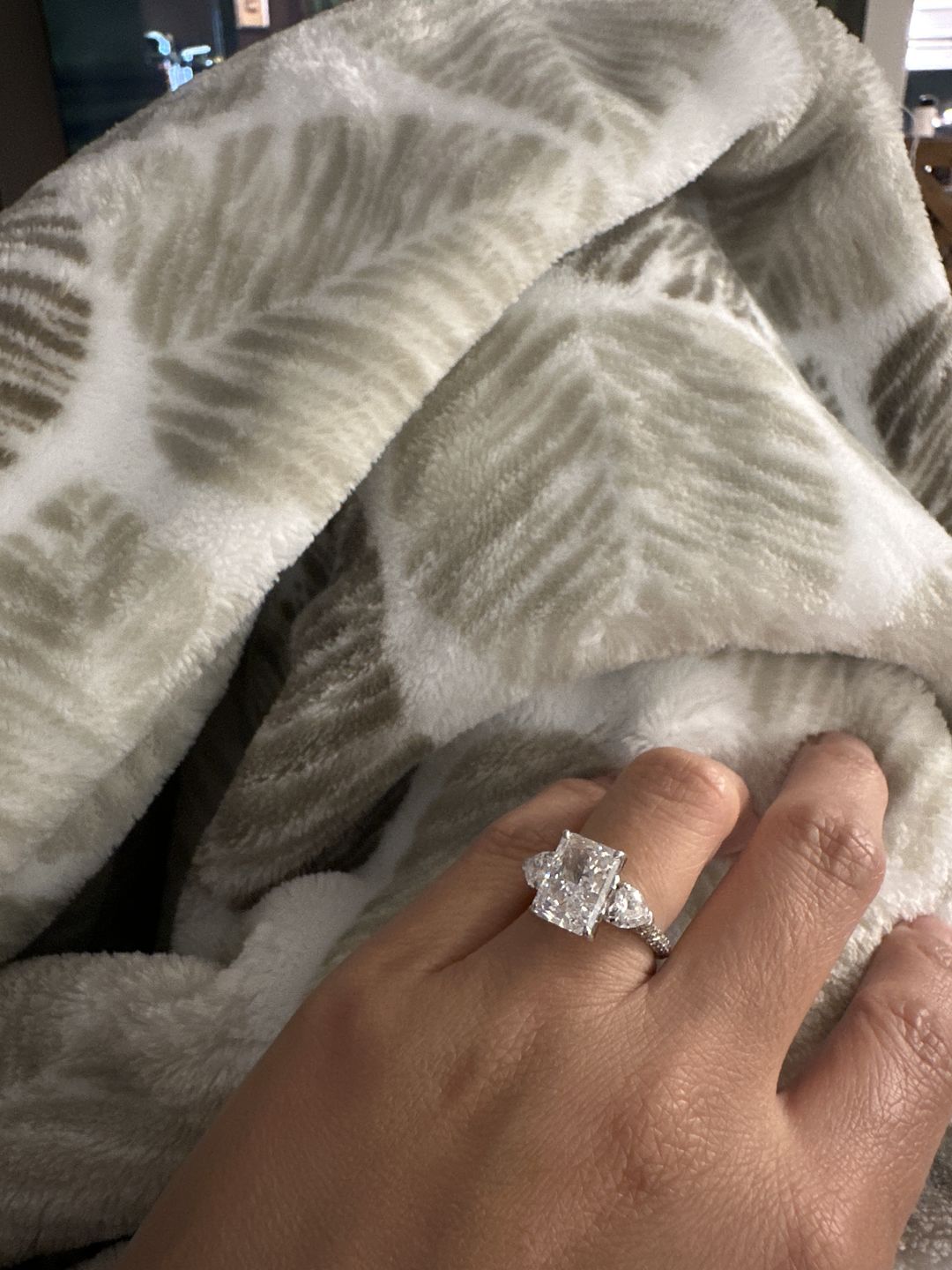 Customer photo review of Louily 5.0 Carat Radiant Cut Three Stone Engagement Ring With Two Heart Cut Side Stones