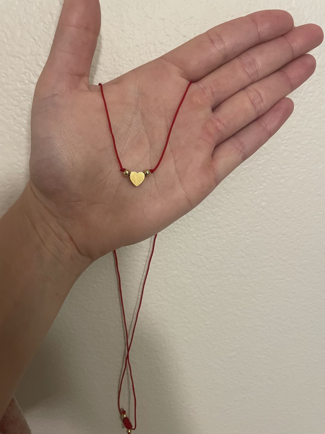 Customer photo review of Heart Protection Amulet Necklace