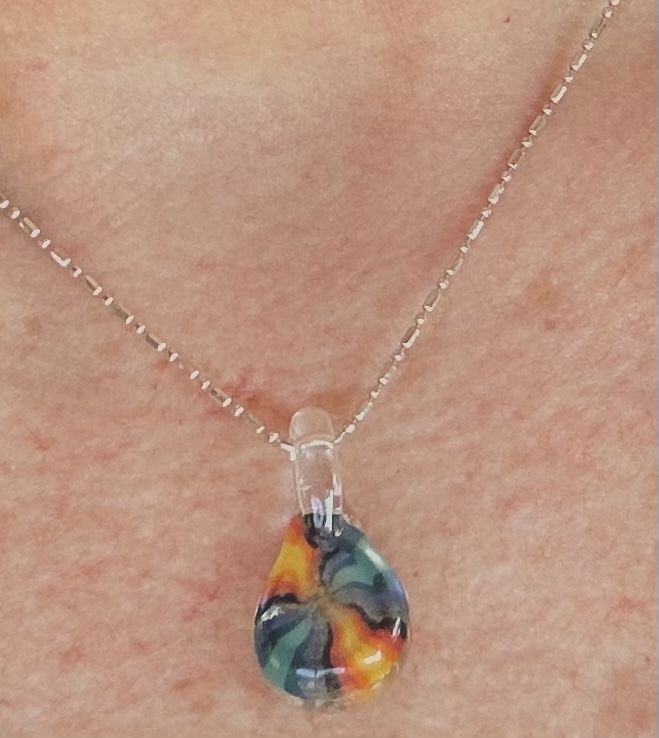 Customer photo review of Tie Dye Pendant with Infused Cremation Ashes