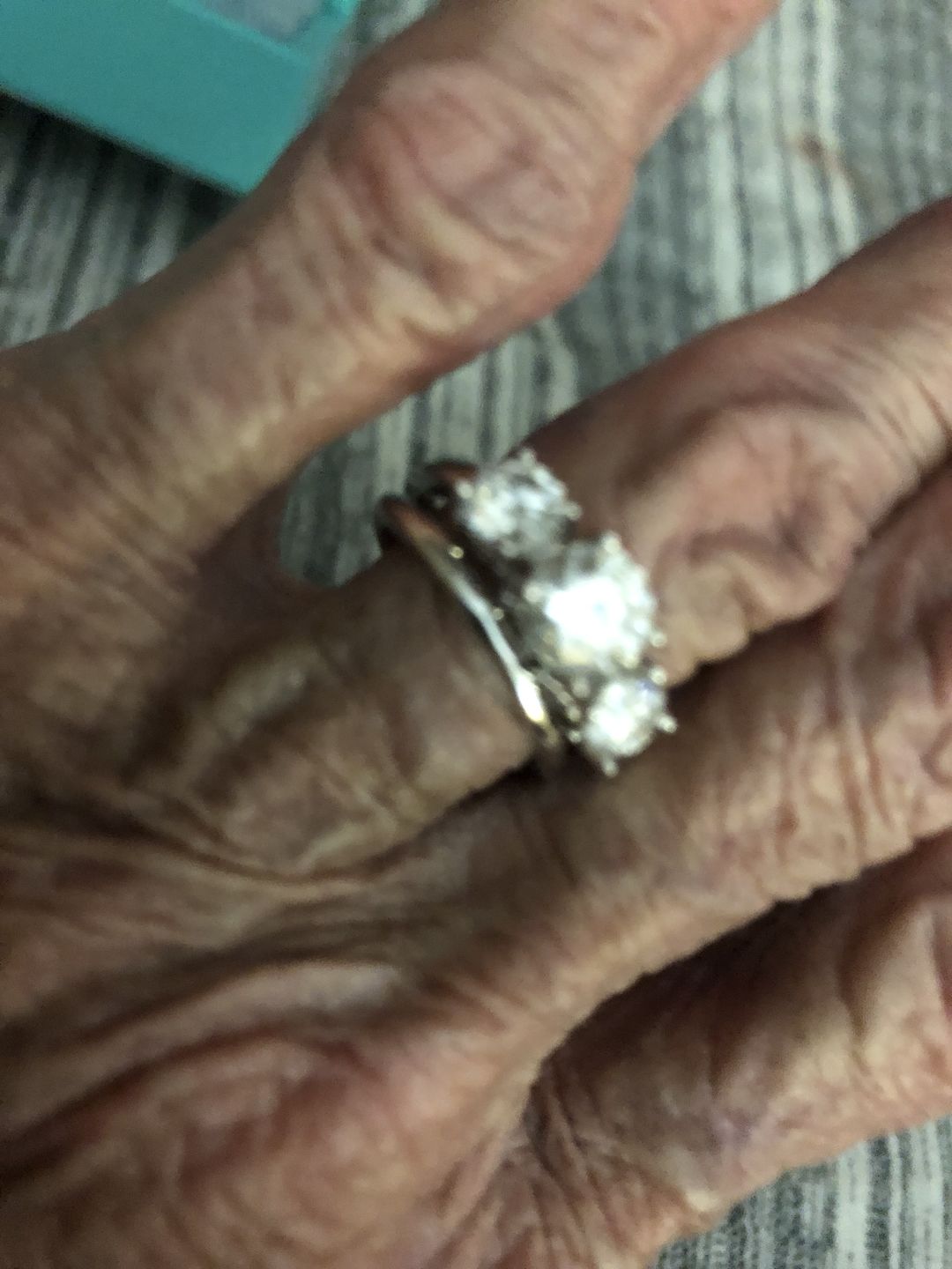 Customer photo review of Classic Three Stone Round Cut Moissanite Sterling Silver Wedding Ring