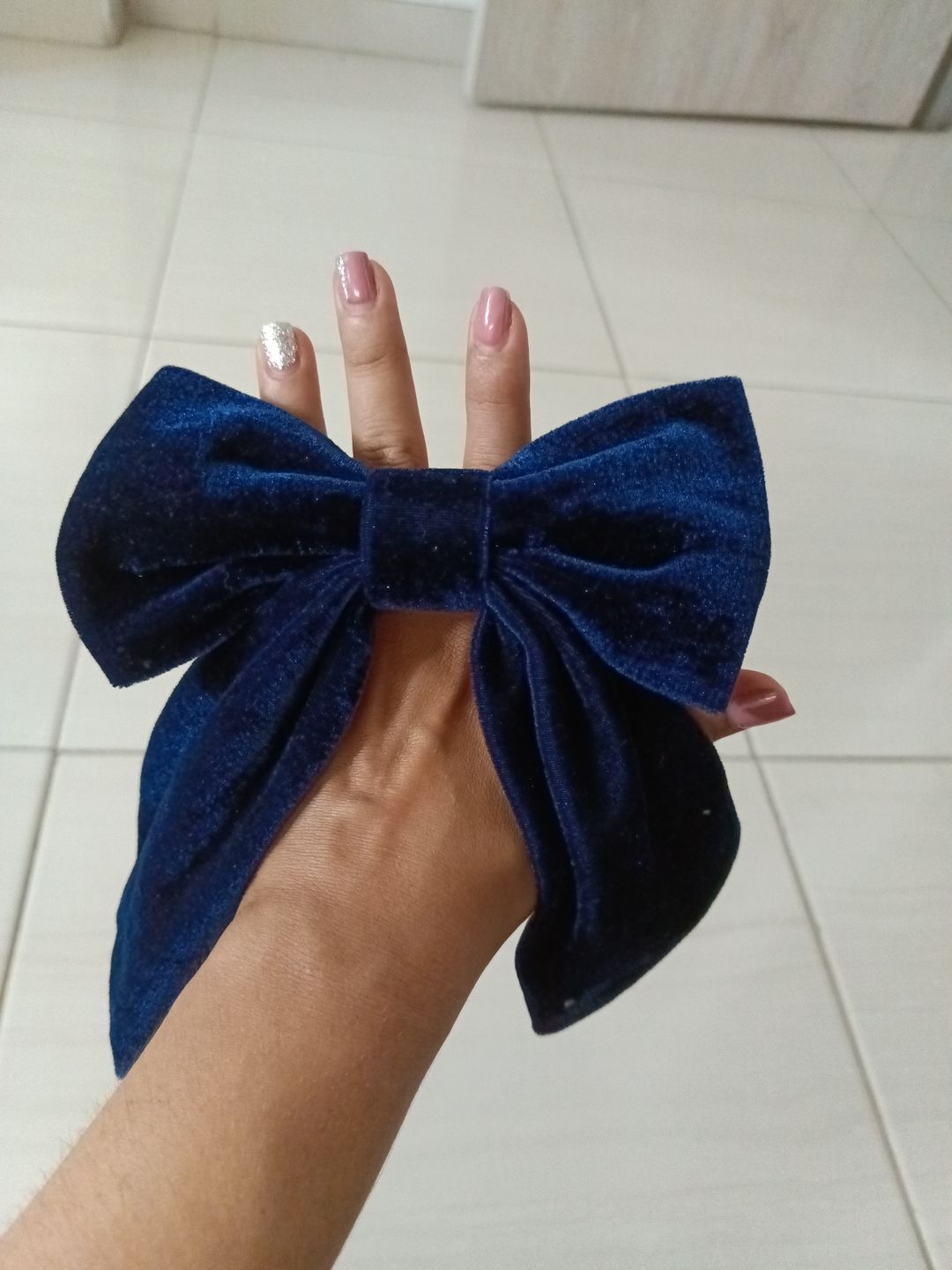 Customer photo review of Moño - Large Blue Bow