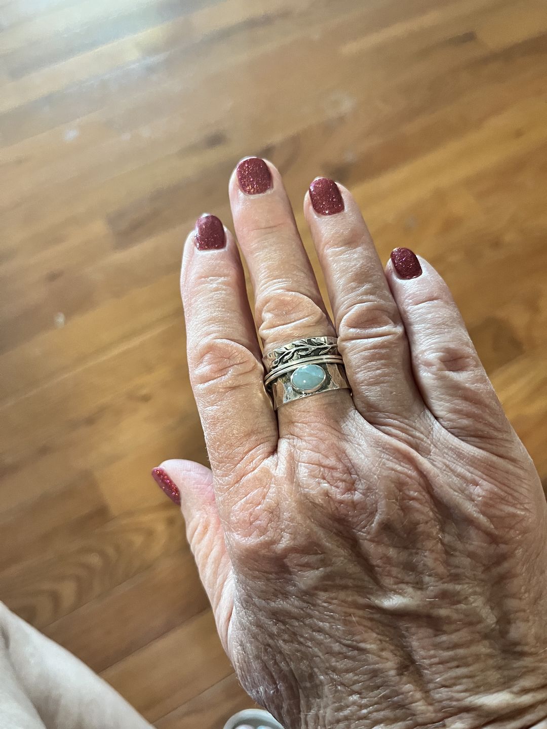 Customer photo review of Aquamarine Leaf Spinner ring Sterling Silver